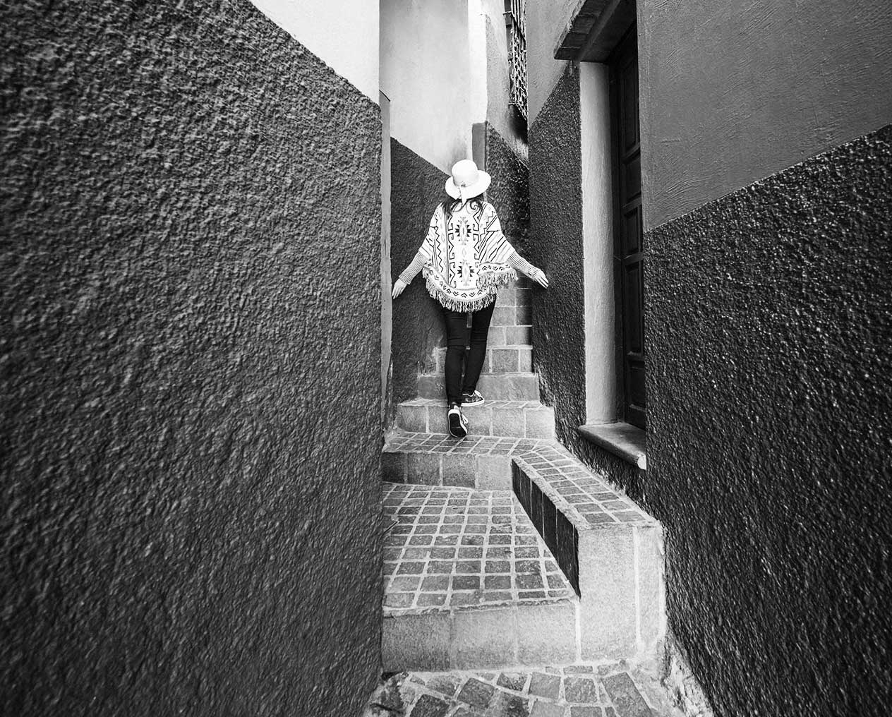 Person walking alley corridor stairway