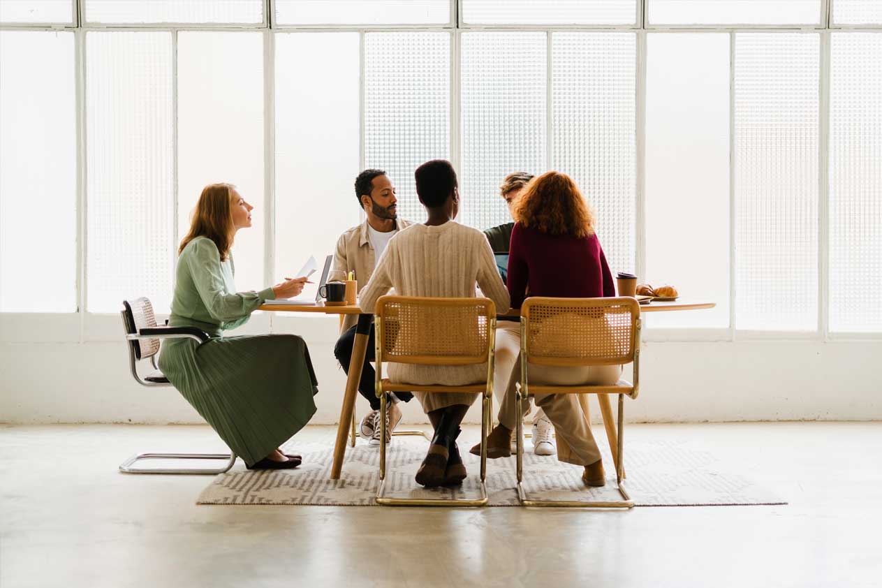 Woman teaching classroom of students