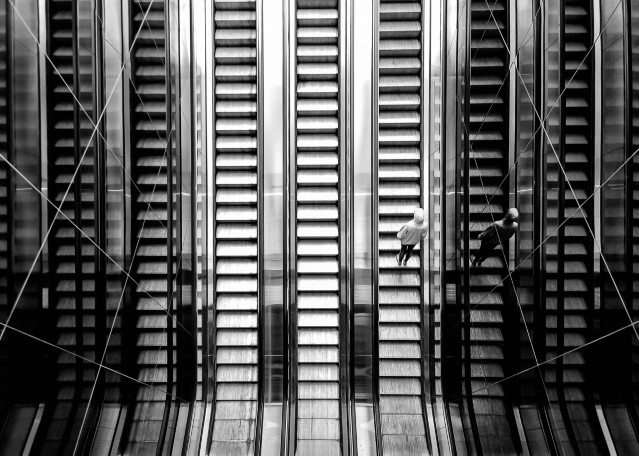 Image of person on escalator