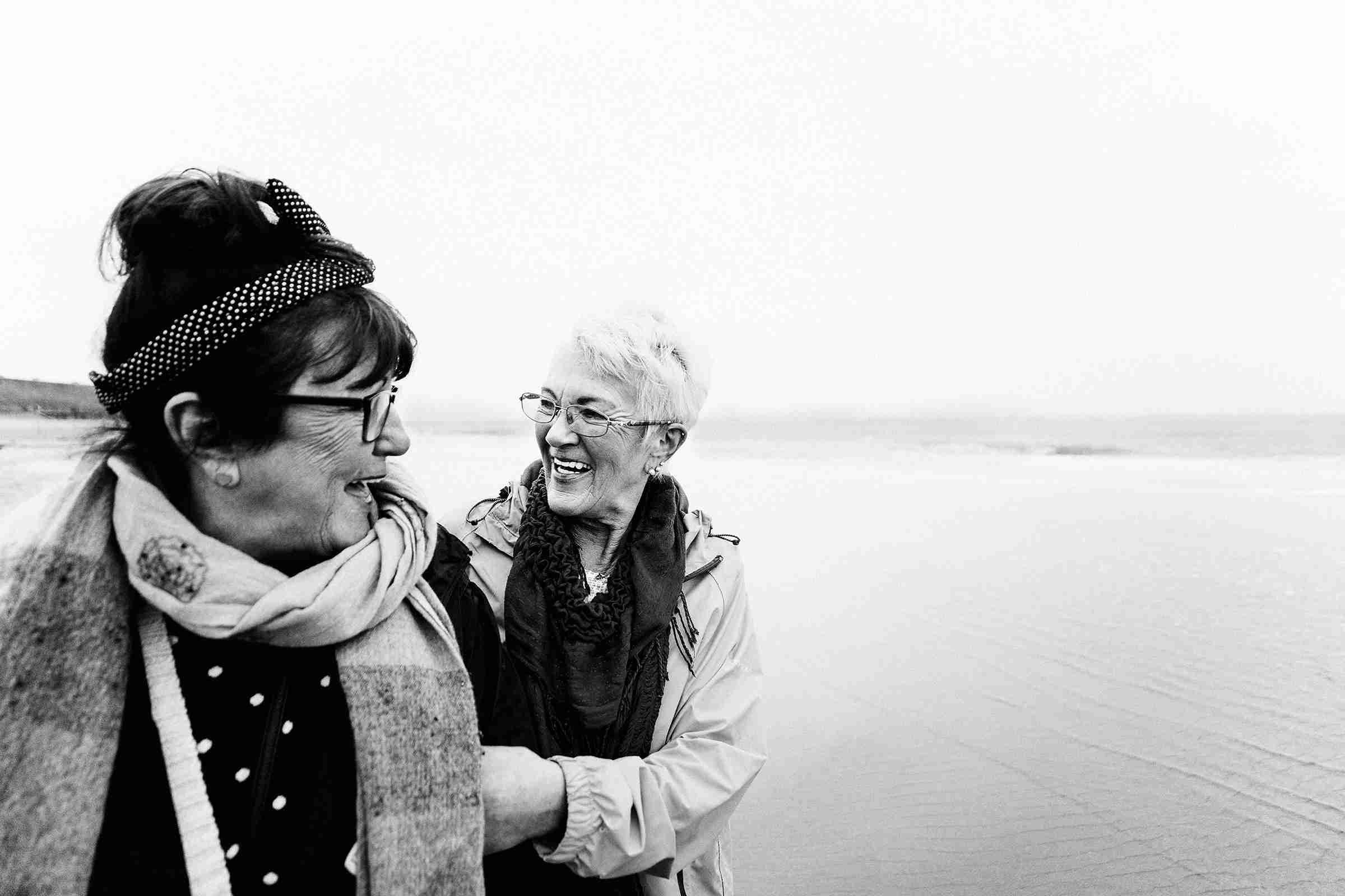 Elderly woman laughing together