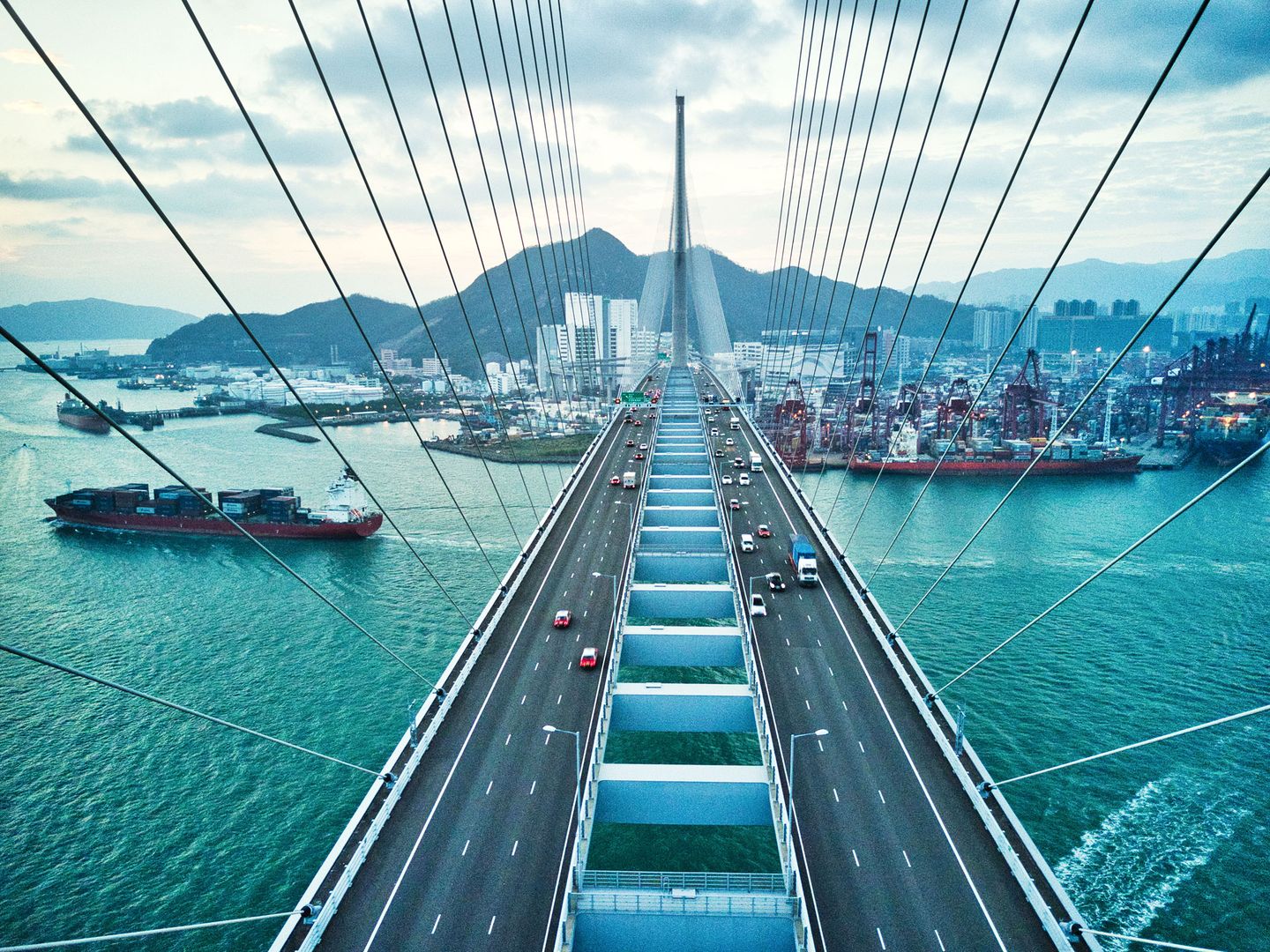Bridge in Hong Kong and Container Cargo freight ship