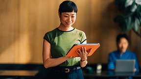 Woman holding a tablet